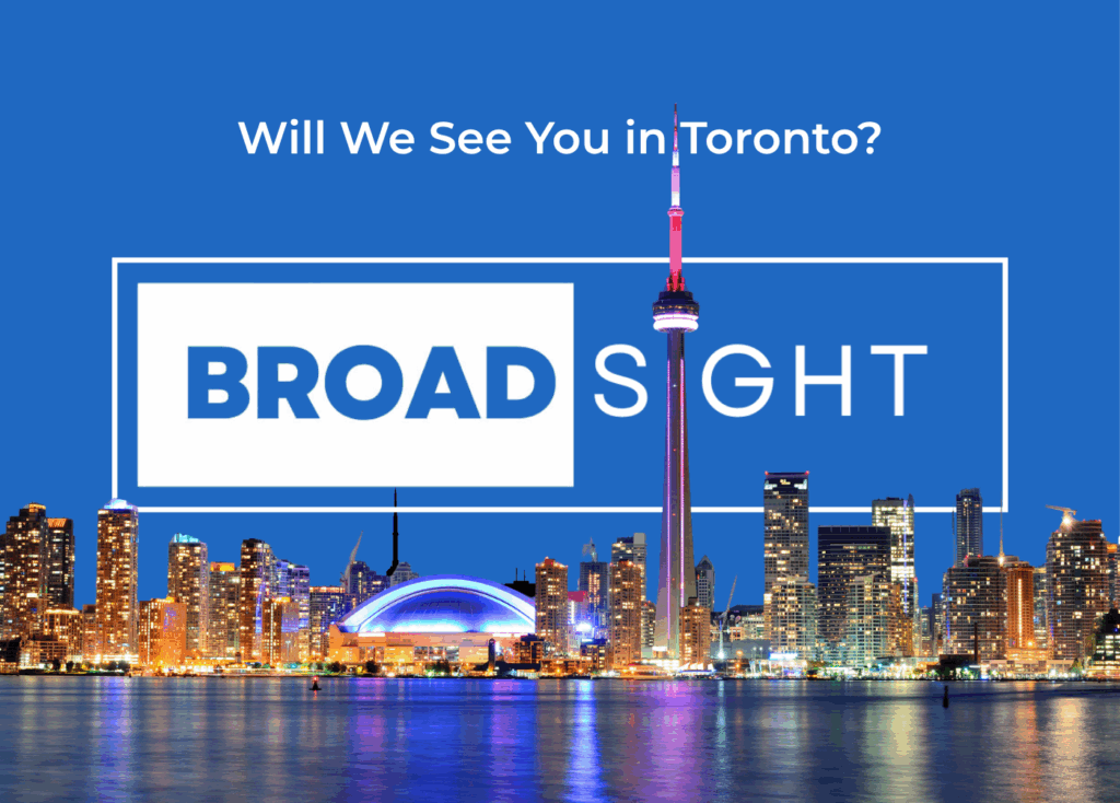 Broadsight logo as the backdrop to the Toronto skyline at night.